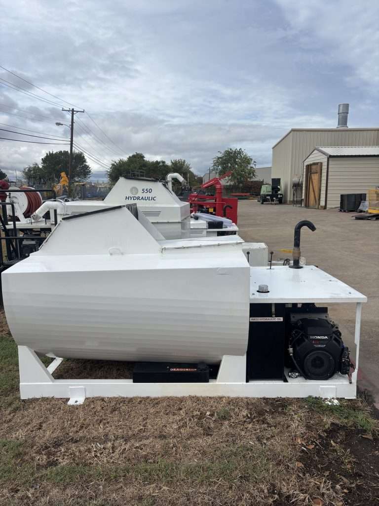 Used 2025 TurfMaker 550 skid hydroseeder for sale (stock TM-U01), side view with Honda 22 hp EFI engine